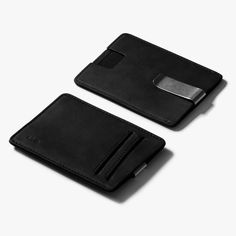 Features: Quick access card slot 2 regular card slots RFID blocking material Money clip Quality treated leather Black Rectangular Wallet With Belt Clip, Minimalist Black Card Holder For Daily Use, Modern Black Leather Card Holder, Modern Black Card Holder With Card Slots, Black Minimalist Wallet With Rfid Blocking, Modern Black Card Holder With Slots, Modern Black Card Holder With Interior Slots, Minimalist Black Rectangular Card Holder, Black Leather Card Holder With Id Window