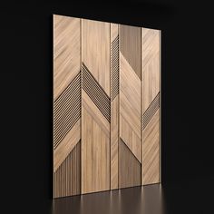 a wood paneled wall with an abstract design on the front and back panels, along with a black background