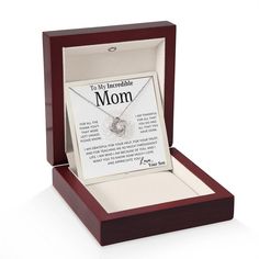 a wooden box with a necklace in it that says i'm my amazing mom