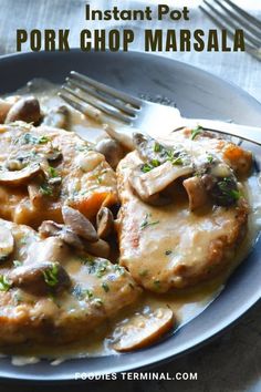 a close up of a plate of food with meat and mushrooms in gravy