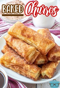 baked churros on a white plate with coffee and glasses in the background text reads baked churros