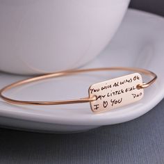 Create a custom bracelet with handwriting. A 14k gold filled bracelet is engraved with custom handwriting. The rectangle disc measures approximately 1 inch wide by 1/2 inch tall. **FITS APPROXIMATELY 15 characters each line (for 3 lines), depending on the handwriting. Possibly a little more but the text will get very small. See the whole section of handwriting jewelry and gifts here: https://www.etsy.com/shop/georgiedesigns?section_id=19578760 After purchasing the listing, please send a photo of Handwriting Bracelet, Engraved Handwriting, Personalised Bangle, Handwriting Jewelry, Bracelet Size Chart, Handmade Gold Jewellery, Gold Diamond Earrings, Engraved Bracelet, Memorial Jewelry