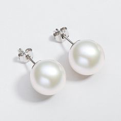 Product Information



SKU:
FWPE-052


Metal:
925 Sterling Silver


Rhodium:
Yes 


Nickle Free:
Yes


Gem Type:
Pearl


Pearl Information



Pearl Type:
Freshwater Pearl


Pearl Color:
White



Number of pearls:
2


Shape:
Round 



Pearl Size :
11mm


Surface markings:
Clean


Blemishes:
Clean


Uniformity:
Very-good


Luster:
High luster Classic White Pearl Earrings With Round Beads, White Round Bead Pearl Earrings For Formal Occasions, Formal White Pearl Round Bead Earrings, White Baroque Pearl Earrings, Pearl White Round Sterling Silver Pearl Earrings, Pearl White Sterling Silver Round Pearl Earrings, Classic Silver Round Pearl Earrings, Classic White Pearl Earrings In Sterling Silver, Classic Sterling Silver Pearl White Earrings