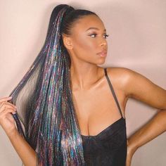 She’s your classic extra long, 26 inch ponytail extension, but with a sparkly tinsel twist. Texturized with a Yaki Perm for added volume, Kacey is your girl for all things fabulous and fun! Length: 26" | 66 cmWeight: 125 gramsStyle: Straight texturized yaki perm pony with a blend of tinsel WHAT'S INCLUDED 2 INH bobby pins1 tester piece to make sure you have the shade that blends best with your hair1 reusable satin storage bag to preserve & protect your INSERT NAME HERE hair BENEFITS Hair that lo Fine Flat Hair, Holographic Hair, Clip In Ponytail, Flat Hair, Funky Hairstyles, Ponytail Extension, Low Ponytail, Your Girl, Heat Styling Products