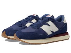 New Balance Classics 237v1 - Men's Shoes : Nb Navy/Vintage Indigo : Add a vintage runner design to your wardrobe with the iconic silhouette of the New Balance Classics 237v1 sneakers. Casual fashion shoe in a sporty silhouette. Textile and synthetic upper with lace-up closure. Foam-padded collar and tongue. Breathable textile lining with removable insole. Synthetic rubber outsole for added traction. Imported. Measurements: Weight: 12 oz Product measurements were taken using size 9, width D - Med Comfortable Nylon Lace-up Sneakers, Low-top Running Shoes With Contrast Sole, Retro Round Toe Running Sneakers, Retro Running Sneakers With Round Toe, Sporty High-top Nylon Walking Shoes, Casual Nylon Running Shoes With Elastic Laces, Casual Nylon Sneakers For Running, Retro Lace-up Synthetic Sneakers, Mid-top Running Sneakers With Rubber Waffle Outsoles