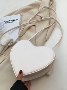 Bag For Love - Bow Decor Heart Design Novelty Bag - Women Crossbody Product Description Color Beige Pattern Type Plain Style Fashionable Bag Size Small Quantity 1 piece Details Bow Type Novelty Bag Composition 100% Polyurethane Material PU Leather Size Chart INCH CM Size Bag Width Bag Height Bag Length Strap Length one-size 2.4 7.9 8.3 43.3 Size Bag Width Bag Height Bag Length Strap Length one-size 6 20 21 110 Similar Products h2 { text-align: center; } .red-box { width: 100%; display: flex; fle Trendy White Heart-shaped Shoulder Bag, White Heart-shaped Shoulder Bag For Daily Use, White Shoulder Bag For Valentine's Day, White Heart-shaped Shoulder Bag For Valentine's Day, White Crossbody Bag For Valentine's Day, Minimalist Purse, Beige Pattern, Trendy Shoulder Bag, Love Shape