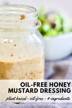 a mason jar filled with honey mustard dressing