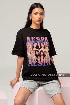 "Aespa Retro 90s T-shirt - Kpop Shirt - Kpop Merch - Aespa Bootleg Shirt - Aespa Merch - Kpop Gift - Aespa Kpop - Karina - Winter - Ningning This is our unisex shirt, and it's true to size. To get the oversized look, you have to choose +1 or +2 of your original size number. If you're not sure about your size, you can refer to our size chart. Reach out if you have any issues with your order! The unisex heavy cotton tee is the basic staple of any wardrobe. It is the foundation upon which casual fashion grows. The specially spun fibers provide a smooth surface for premium printing vividity and sharpness. No side seams mean there are no itchy interruptions under the arms. The shoulders have tape for improved durability. .: 100% cotton (fiber content may vary for different colors) .: Medium fab Aespa Merch, Y2k Merch, Merch Kpop, Karina Winter, Aespa Kpop, Winter Ningning, Kpop Tshirt, Bootleg Shirt, Kpop Shirts