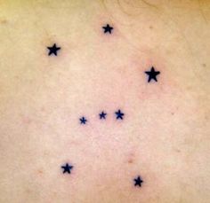 a woman's back with stars on it