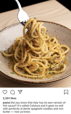 someone is eating spaghetti with a fork in their hand and the caption reads, pasta did you know that italy has its own version of fish sauce?