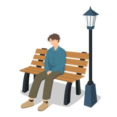 a man sitting on a bench next to a lamp post