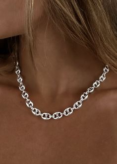 The Puffed Mariner Chain is a classic style that has stood the test of time. Create a bold stack by mixing this sterling silver necklace with a yellow gold herringbone chain. Features a lobster clasp closure. 925 sterling silver. Average weight: 38.1g Width: 9mm Classic Chunky Jewelry As Gift, Classic Chunky Jewelry As A Gift, Classic Sterling Silver Jewelry With Chunky Chain, Silver Chunky Classic Jewelry, Classic Silver Chunky Jewelry, Classic Chunky Silver Jewelry, Silver Chunky Chain Oval Necklace, Silver Necklace With Chunky Oval Chain, Silver Oval Necklace With Chunky Chain