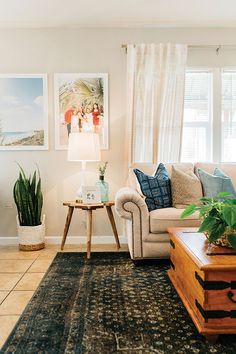 a living room filled with furniture and decor