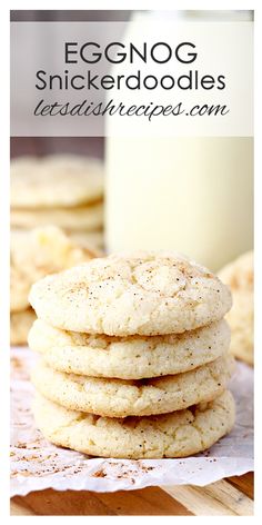 eggnog snickkerdoodles stacked on top of each other with a glass of milk in the background