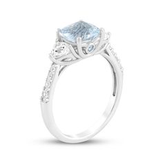 This glimmering aquamarine ring makes an unforgettable gift for your special occasion. Sterling silver A cushion-cut aquamarine is flanked by trillion-cut white lab-created sapphires Bezel-set round aquamarines shimmer on the sides of the setting Round-cut white lab-created sapphires line the tapered shank