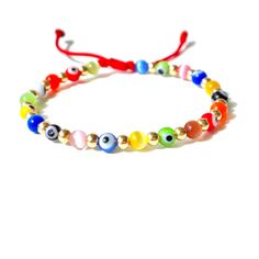 "Multicolor evil eye beads bracelet on adjustable red or black string interspersed with milky way glass beads and gold-filled accent beads  Bracelet is made safe for you to get it wet so you can keep it on all the time with our adjustable sliding knot that will let you adjust the bracelet to a perfect fit Wrist size is custom-made to your own wrist and beads are 4mm wide approx. Handmade with Love and care in our workshop Free shipping in USA Ready to ship today Safe to get wet Made in USA ♡ 𝗠? Cheap Multicolor Evil Eye Bracelet With Round Beads, Trendy Adjustable Multicolor Evil Eye Bracelet, Trendy Adjustable Evil Eye Friendship Bracelets, Adjustable Hand-strung Evil Eye Bracelet For Festival, Adjustable Multicolor Evil Eye Bracelet As Gift, Adjustable Beaded Evil Eye Bracelet, Adjustable Spiritual Evil Eye Beaded Bracelets, Adjustable Spiritual Beaded Bracelet With Evil Eye, Spiritual Adjustable Evil Eye Beaded Bracelets