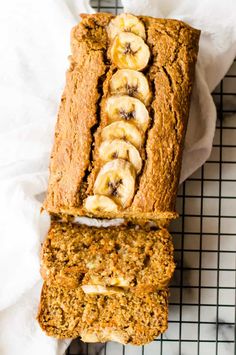 two slices of banana bread sitting on top of a cooling rack next to each other