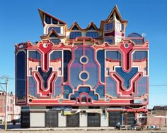 a large building with many windows and designs on it