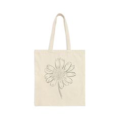 "You will love this floral tote, perfect for shopping!  This easy to carry bag is made out of 100% cotton canvas.  It features 20\" canvas handles that are durable and will last for years.  This bag comes in one size - 15\" x 16\"- perfect for everyday wear." Eco-friendly Floral Canvas Bag For Everyday Use, Eco-friendly Floral Print Canvas Bag For Everyday Use, Cotton Flower-shaped Bag For Daily Use, Everyday Cotton Canvas Bag With Floral Print, Everyday Floral Print Cotton Canvas Bag, Floral Print Cotton Flower-shaped Bags, Eco-friendly Cotton Canvas Bag With Floral Print, White Cotton Canvas Bag With Floral Print, White Floral Cotton Canvas Bag