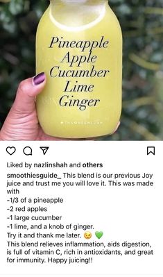 a person holding up a jar of liquid with the caption'pineapple apple cucumber ginger '