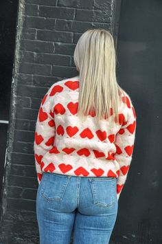 The Pink and Blush Heart Knitted Sweater is a delightful and versatile addition to your wardrobe. This multi-color heart sweater is designed as a pull-over style, making it easy to wear and layer. With its pink and blush heart pattern, it's the perfect piece to embrace the Valentine's season in style. This sweater pairs effortlessly under a vest, creating a cozy and chic look that's perfect for casual outings or gatherings. Combine it with your favorite pair of jeans for a comfortable and fashio Color Heart, Heart Sweater, Fall Clothes, Form Fitting Dress, Heart Pattern, Kimono Jacket, Colorful Heart, New Tops, Clothing Co