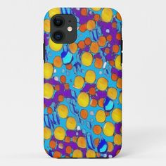 an iphone case with colorful bubbles and circles in blue, yellow, orange and purple