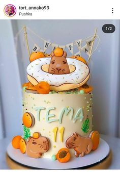 a birthday cake with an animal theme on it