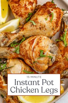 instant pot chicken legs on a plate with lemon wedges