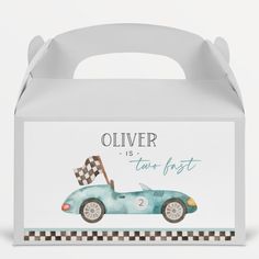 a blue car with a checkered flag on it's side and the words oliver is two - first