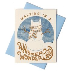 a card with a cat on it and the words walking in a whiskered wonderland