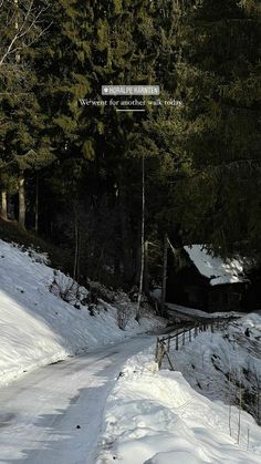 a person riding skis down a snow covered slope