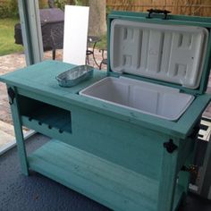 an ice chest sitting on top of a table