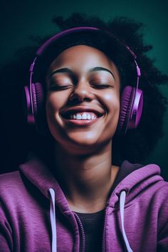 a woman wearing purple headphones and smiling