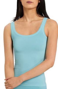 This seamless tank cut from buttery-soft microfiber comfortably stays in place and is perfect for layering. 22 1/2" length (size Medium) Scoop neck 95% polyamide, 5% elastane Machine wash, dry flat Made in Portugal Lingerie Cotton Camisole, Yoga Tank Tops, Layering Tanks, Grey Tank Top, Shirt Dress Casual, Career Dress, Blazer And Shorts, Maxi Dress Party, Pink Tank Top