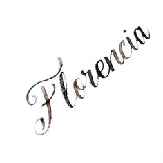 the word flora written in cursive writing on a white background