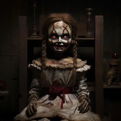 a creepy doll sitting in a dark room