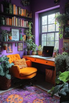 an orange chair sits in front of a desk with a laptop on it, surrounded by potted plants and bookshelves