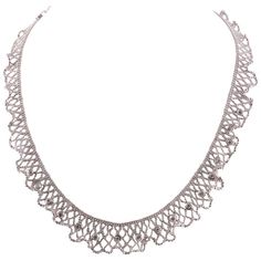 Beautiful 18 Karat White Gold Lace and Diamond Necklace | From a unique collection of vintage Choker Necklaces at https://www.1stdibs.com/jewelry/necklaces/choker-necklaces/. Luxury White Filigree Necklace, Silver Platinum Bridal Necklace With Single Cut Diamonds, Silver Bridal Necklace With Single Cut Diamonds In Platinum, Luxury Platinum Bridal Necklace In Silver, Luxury Silver Platinum Bridal Necklace, Luxury Platinum Silver Bridal Necklace, Luxury Silver Bridal Necklace In Platinum, White Gold Diamond Necklace With Filigree, Silver Platinum Bridal Necklace With Diamond Cut