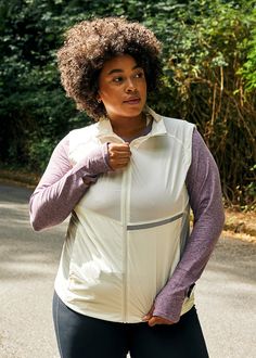 The Vigor Vest has earned its rep as an all-time favorite! Because vests are ideal for both protection and cooling. Featuring our stay-safe reflective mesh as inset panels (chest and back), and logo detailing at the rear. In addition to full zip hand pockets, one turns into a self-storage front pocket, with an elastic strap, for easy carrying in hand, or on your arm for hands-free movement. All other elements remain the same: premium Pertex™ fabric, adjustability, windproof, water resistant, rea Alteration Shop, Free Movement, Self Storage, Morning Running, Lookbook Outfits, Vest Top, Stay Safe, Hands Free, Stay Warm