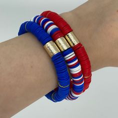 This 8mm heishi stack is the perfect accessory for all your patriotic festivities. Bracelets are “one size fits most” and are designed to fit wrists up to 7.0”. Custom sizes available upon request. Please email designsby.kb@yahoo.com once your oder is placed. *Bracelets usually ship within 3-5 business days. Heishi Bracelet Ideas, Heishi Bracelet, Patriotic Jewelry, Preppy Bracelets, America The Beautiful, Disc Bracelet, Anti Hero, 4th Of July Decorations, Bracelets Diy