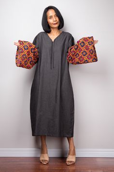 "Denim cotton dress with embroidered wide chiffon sleeves PRODUCT SIZE : One Size Fits Most * Chest : up to 42\" * Waist : up to 42\" * Hips : up to 46 \" * Length : 44\" from shoulder to hem * Shoulder tot shoulder : 18.5\" * Sleeve length : 22\" from shoulder to hem * Armhole : 21\" Please note that all measurements have been taking when the dresses were laying flat. MATERIAL * Denim cotton * Sleeves are chiffon with embroidery MODEL : * Model chest : 32\", waist : 24\" hips : 35\" * Combined Boho Denim Dress, Kaftan Tops, Denim Jean Dress, Chiffon Sleeves, Tie Dye Jumpsuit, Boho Denim, Black And White Aesthetic, Denim Cotton, Wide Sleeves