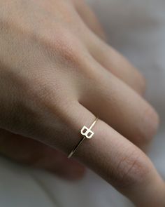 Dainty 14K Initial Letter Ring Simple, minimalist everyday Alphabet Initial Ring Each initial measures approx. 4.8mm Available in 14K Yellow Gold or 14K White Gold * Leave us your initials and placement in the comment box at checkout. PLEASE READ BELOW BEFORE PURCHASE --------------------------------------- SIZE: US5, US6, US7 Letter: A-Z or an heart charm --------------------------------------- SHIPPING UPGRADES You can find shipping upgrades options in the drop bar menu when you check out. + W Gold Stackable Rings With Initials For Everyday, Everyday Gold Stackable Rings With Initials, Minimalist Midi Rings With Initials, Simple 14k Gold Initial Ring, Dainty Tiny Initial Ring In 14k Gold, Dainty 14k Gold Tiny Initial Ring, Tiny Dainty 14k Gold Initial Ring, Modern 14k Gold Initial Ring For Everyday, Minimalist Yellow Gold Stackable Rings With Initials