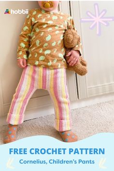 a child holding a teddy bear in front of a wall with the text free crochet pattern cornelis, children's pants