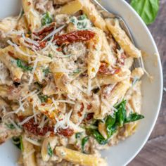 this creamy spinach and sun dried tomato turkey sausage pasta is the perfect meal to enjoy