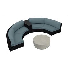 an outdoor furniture set with blue cushions and a round table in front of the couch