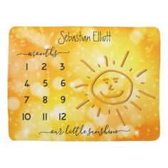 a yellow and orange calendar with the sun on it