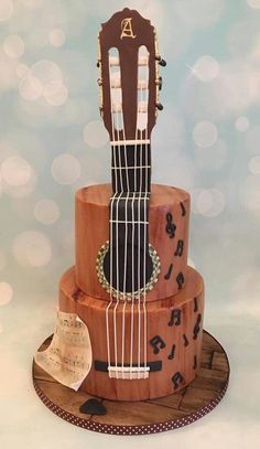 a cake made to look like an acoustic guitar