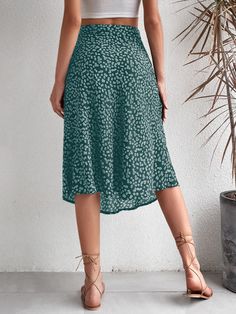 Floral Print Skirt with Split Thigh | Pomona and Peach Green Knee-length Bottoms, Elastic Waistband Knee-length Flowy Skirt, Green Relaxed Fit Knee-length Skirt, Knee-length Green Beach Bottoms, Flowy Skirt For Spring, Green Knee-length Beach Bottoms, Casual Flowy Hip-length Skirt, Casual Hip-length Flowy Skirt, Casual Mid-thigh Length Skirt