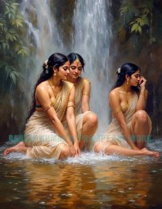 three women sitting in the water next to a waterfall