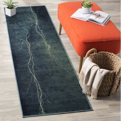 a blue area rug with lightning on it